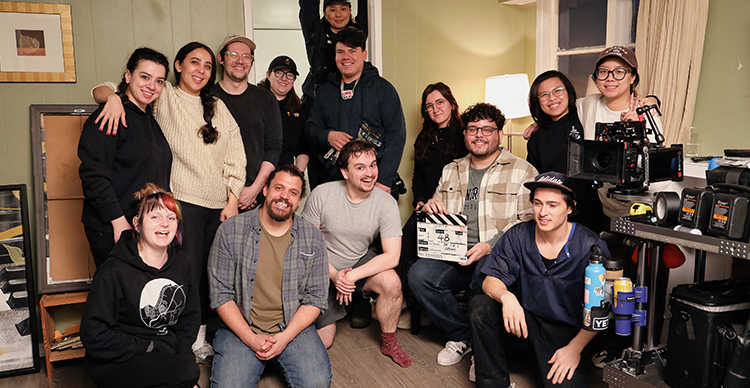 Director Gabriel Souza Nunes giving direction to lead actor Diego Arciniega on the set of I absolutely hate this place, a Voices With Impact grant recipient. Producer Aries Ceta also featured.