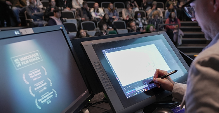 Game Design student at Vancouver Film School playtesting their custom-built video game.