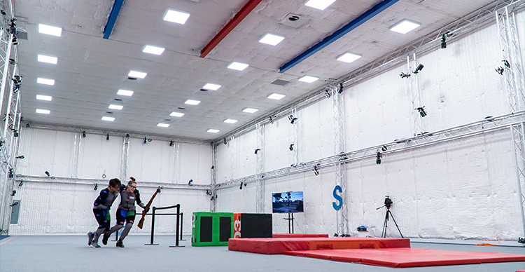 Vancouver Film School Acting students train in professional production facilities, including film sets, a green screen studio, and a large motion capture volume.