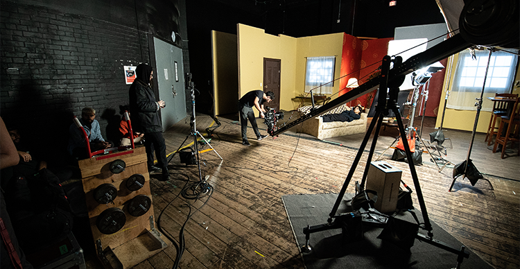 Vancouver Film School Acting students train in professional production facilities, including film sets, a green screen studio, and a large motion capture volume.