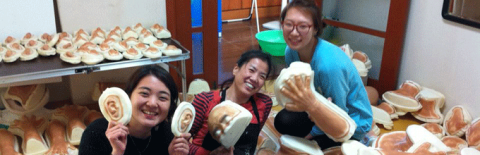 With prosthetics.